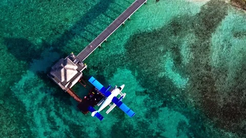 A top down view of a seaplane loading Stock Footage 249436778