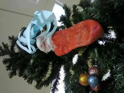 Stocking on the Christmas Tree Stock Photos