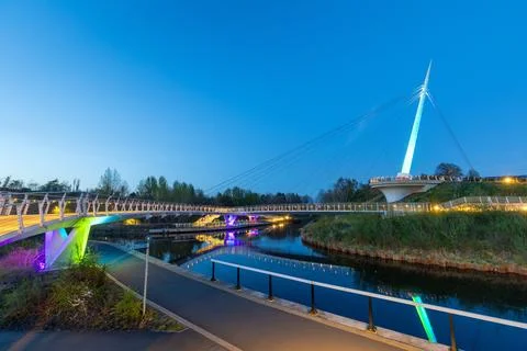 Stockingfield Bridge spans the Forth and Clyde Canal at dusk in Glasgow, Stock Photos