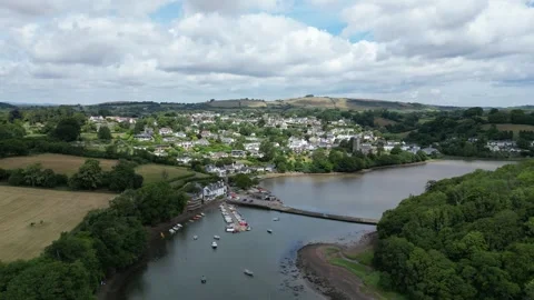 Stoke Gabriel, South Devon, England: DRONE VIEWS: The Mill Pond and village Stock Footage 244523977