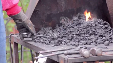 Stoking the Fire Stock Footage 7767904