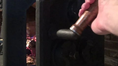 Stoking Fire Video stock 46857755