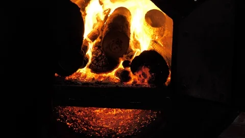 Stoking the fire Stock Footage 93766806
