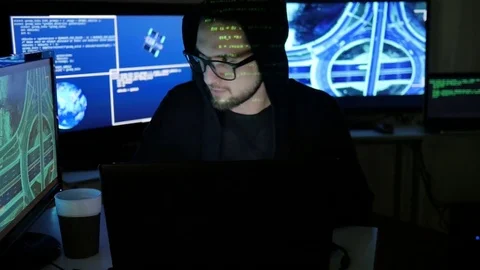 Stolen bank card hacker Holds in hands, Cyber criminal, steal finances through Stock Footage
