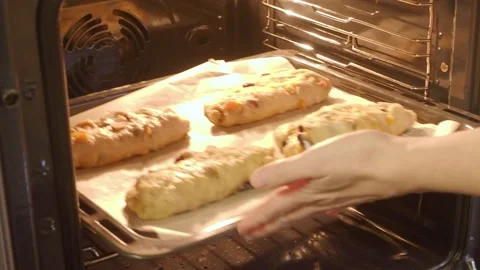 Stollen take to oven Stollen02197589 Stock Footage 303380292