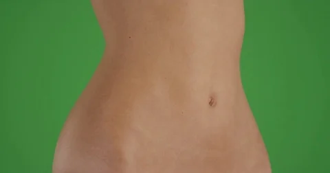 Stomach of attractive woman standing over Chroma key Stock Footage