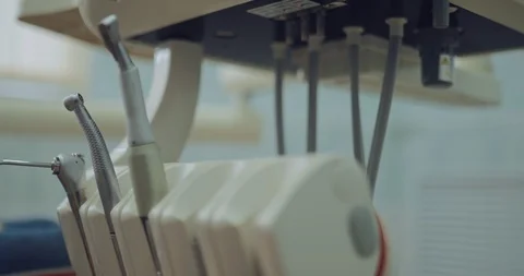 Stomatolg tools are in the working installation. Hand takes bor. Close-up. Stock Footage 107636646