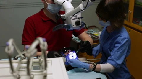 Stomatology. Dentist exam teeth with microscope Stock Footage 62872265