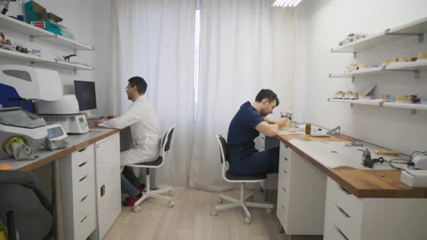 Stomatology Laboratory Technicians Assembling Artificial Dental Restorations Stock Footage 200872779