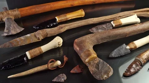 Stone Age Tools on black Background Stock Footage 317438257