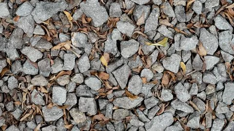 Stone aggregate materials for construction. split texture stone with brown le Stock Photos