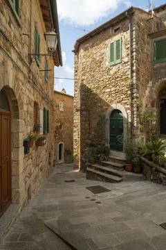 A stone alley in the town of Campiglia Marittima in Tuscany Stock Photos