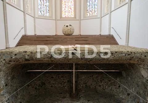Stone altar. Opened Bible. Lighting phenomenon. ~ Hi Res #242773443