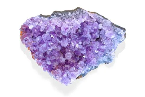 Stone of amethyst in close-up isolated Stock Photos