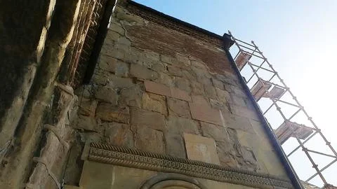 Stone and brick wall facade of Anchiskhati Basilica with construction  Stock Photos