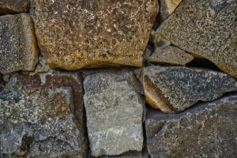 Stone and brick wall with various textures Foto stock