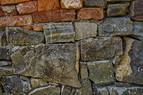 Stone and brick wall with various textures Foto stock