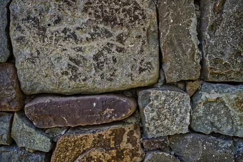 Stone and brick wall with various textures Foto stock