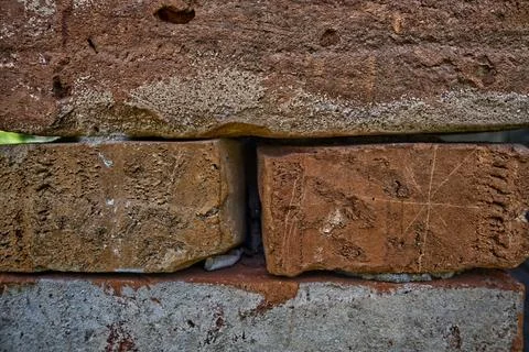 Stone and brick wall with various textures Foto stock