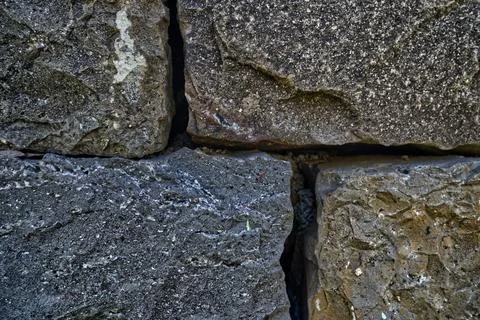 Stone and brick wall with various textures Foto stock