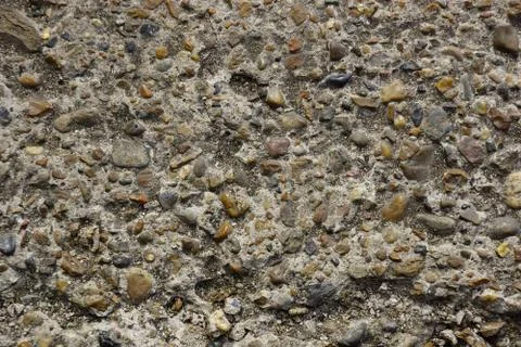Stone and cement texture background. small river stones with cement for sidew Stock Photos