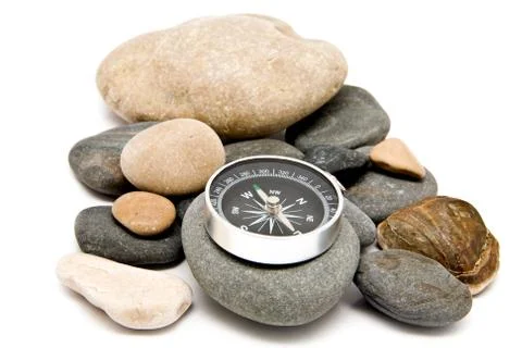 Stone and compass Stock Photos