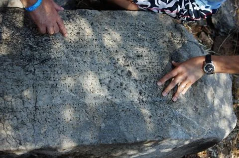 Stone and hands Stock Photos