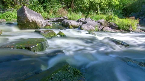Stone and river time lapse Stock Footage 99154352