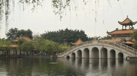 Stone arch bridge and Pavilion - panning Stock Footage 5504173