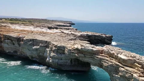 Stone Arch Kamara and Coastal Rocks, Crete Stock Footage 305264491