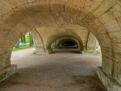 Stone arch with large vaults. Stock Photos
