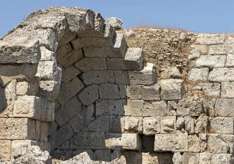 Stone arched shops along the eastern edge of the stadium in the ancient city of Stock Photos