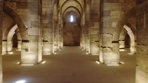 Stone arches and columns line Sultanhani Caravanserai - Cultural Landmark Stock Footage 340525122