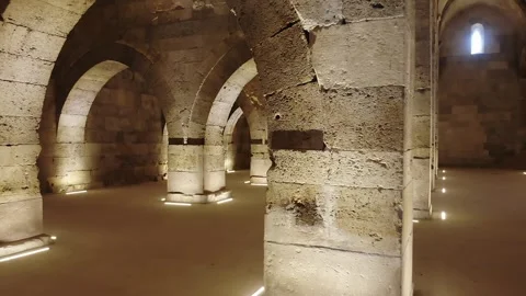 Stone arches and columns line Sultanhani Caravanserai - Historic Corridor Stock Footage 340608541