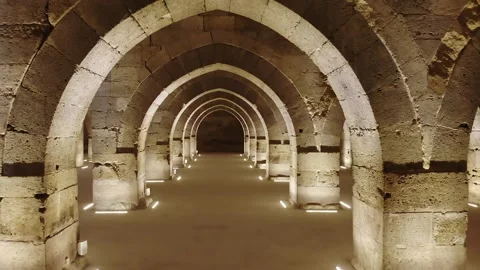 Stone arches and columns line Sultanhani Caravanserai interior - Masonry Pillars Stock Footage 340608545