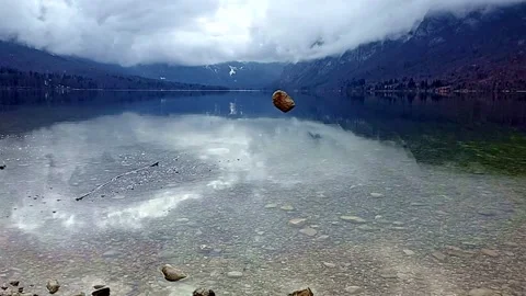 The stone are dropping in the water. Slow motion Video stock 152249696