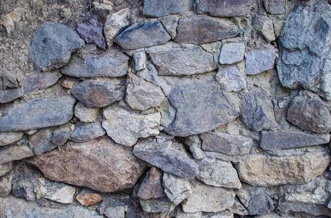 Stone background. A chipped stone texture pattern Stock Photos