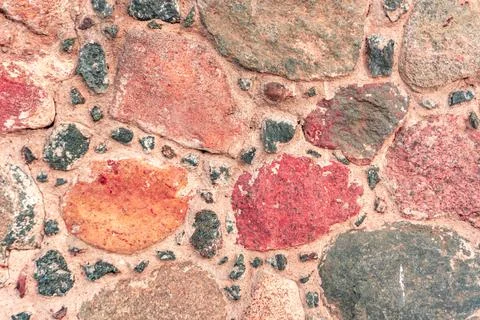 Stone background, close-up stone wall, cobblestone masonry, cobblestone pattern Stock Photos