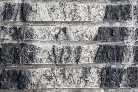 Stone background closeup texture. Focus on the pattern of the surface. Stock Photos