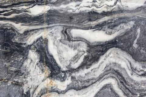 Stone background closeup texture. Focus on the pattern of the surface. Stock Photos