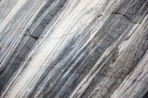 Stone background closeup texture. Focus on the pattern of the surface. Stock Photos