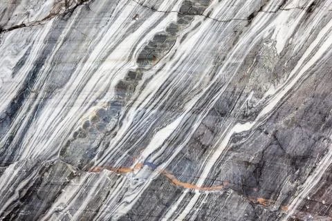 Stone background closeup texture. Focus on the pattern of the surface. Stock Photos