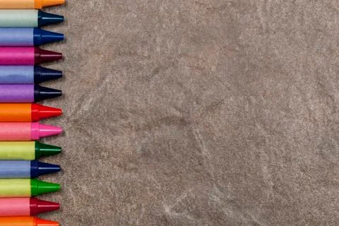 Stone background with a colouring crayon border Stock Photos