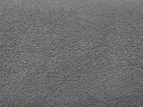 Stone background, embossed gray cement wall. Stock Photos