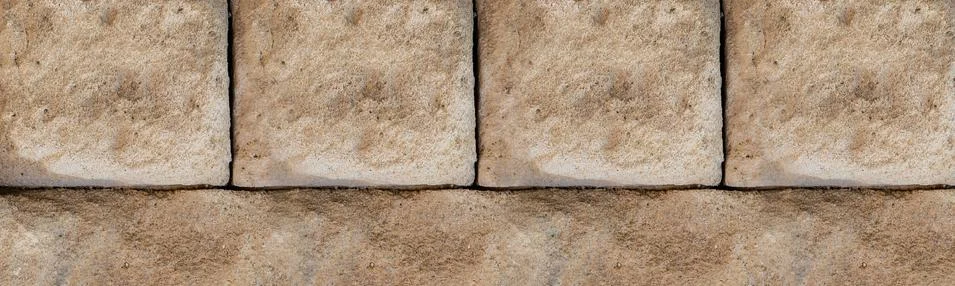 Stone background light beige is solid weathered folded a solid wall close-up Stock Photos
