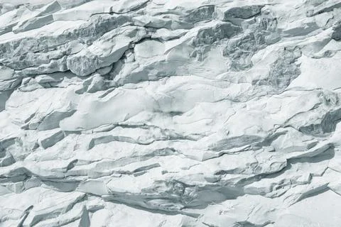 Stone background of light gray slate,  texture of cliff Stock Photos