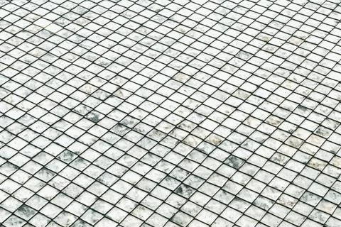 Stone background old gray background triangle roof mural endless row of tiles Foto stock