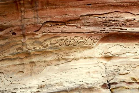 Stone background with a pattern similar to Arabic script Stock Photos