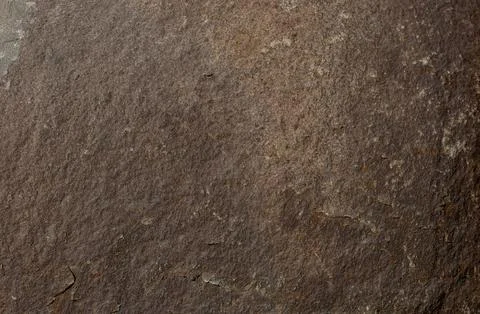 Stone background of rusty color from a single piece. Beautiful textured Stock Photos