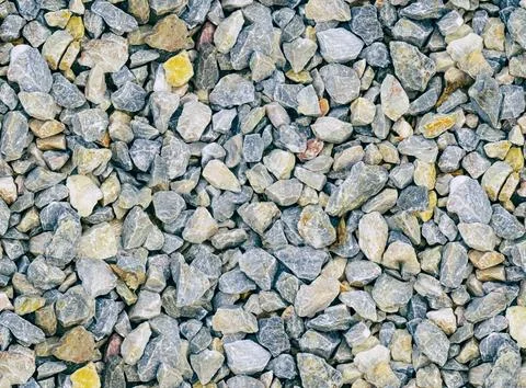 Stone background solid, texture gravel closeup top view Stock Photos